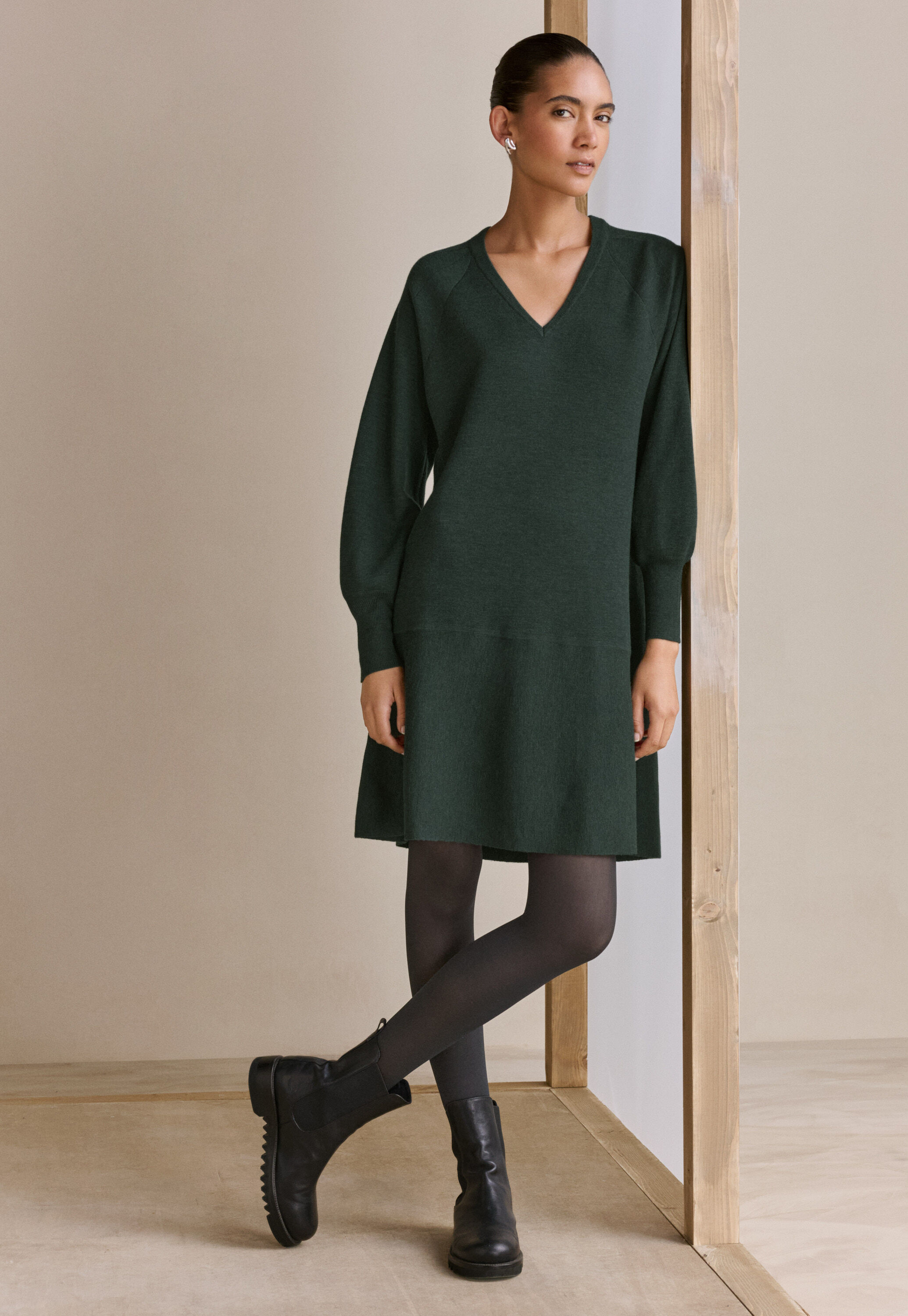 Kleid mit Peplum-Saum