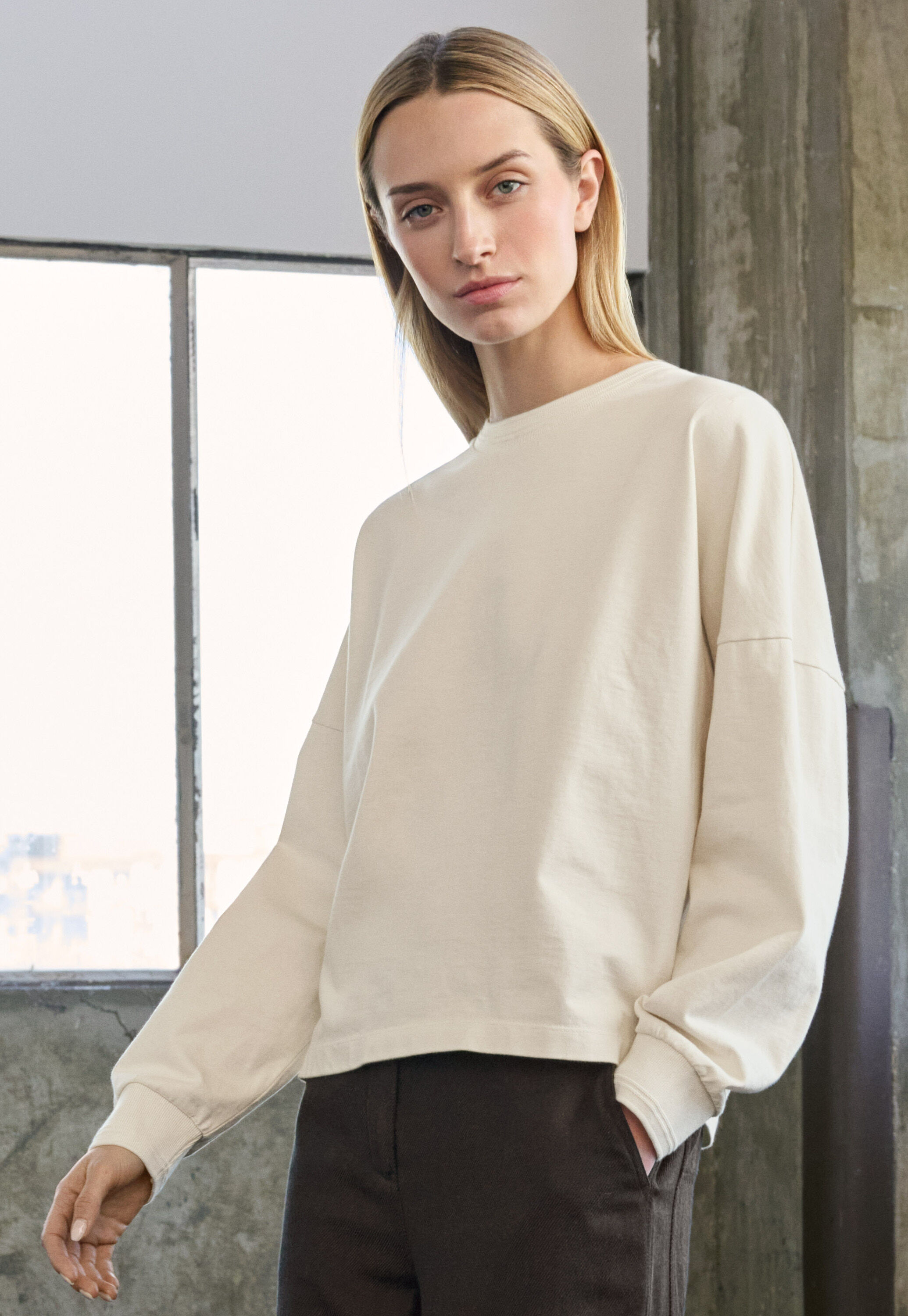 Kleid mit Peplum-Saum
