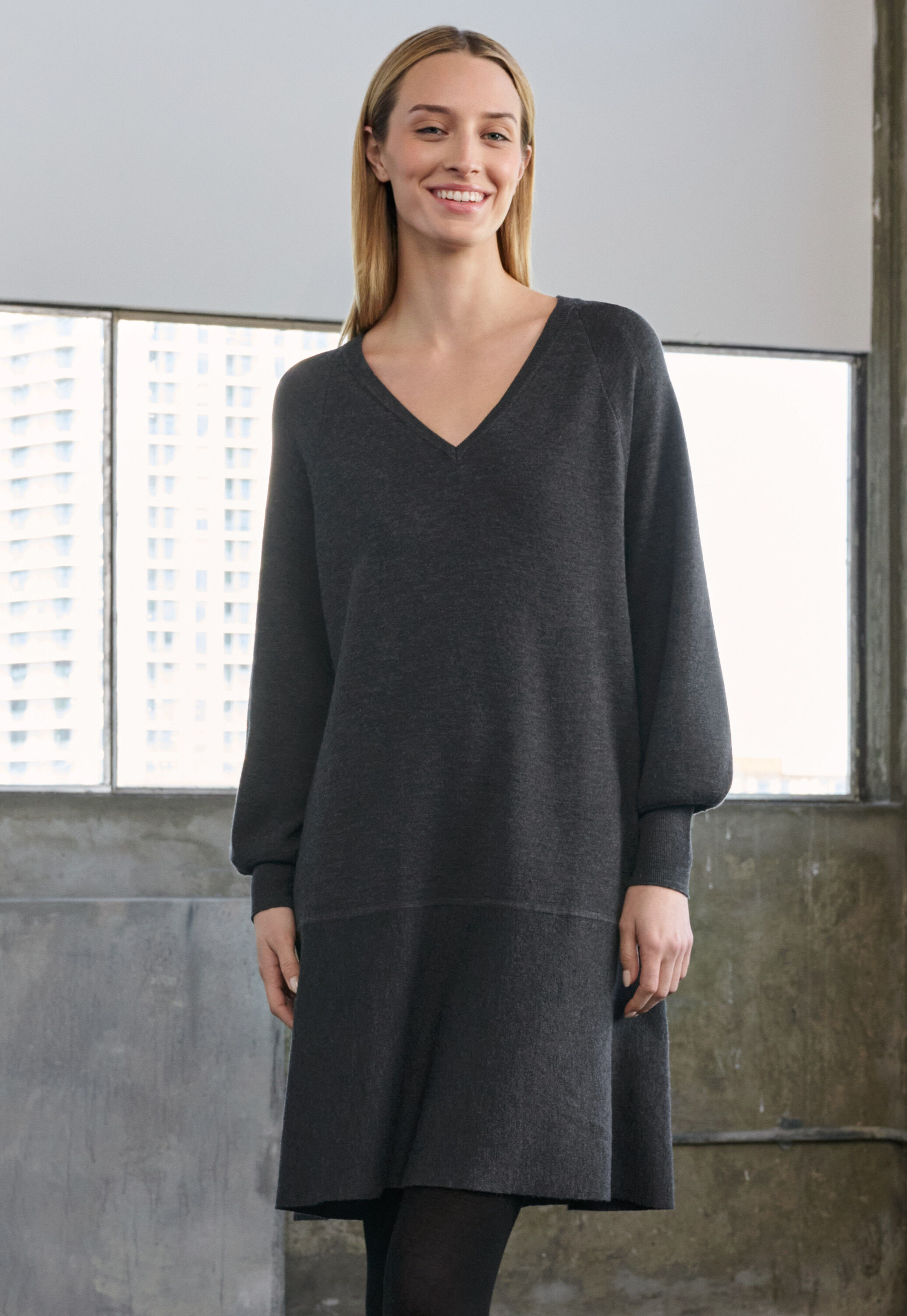 Kleid mit Peplum-Saum