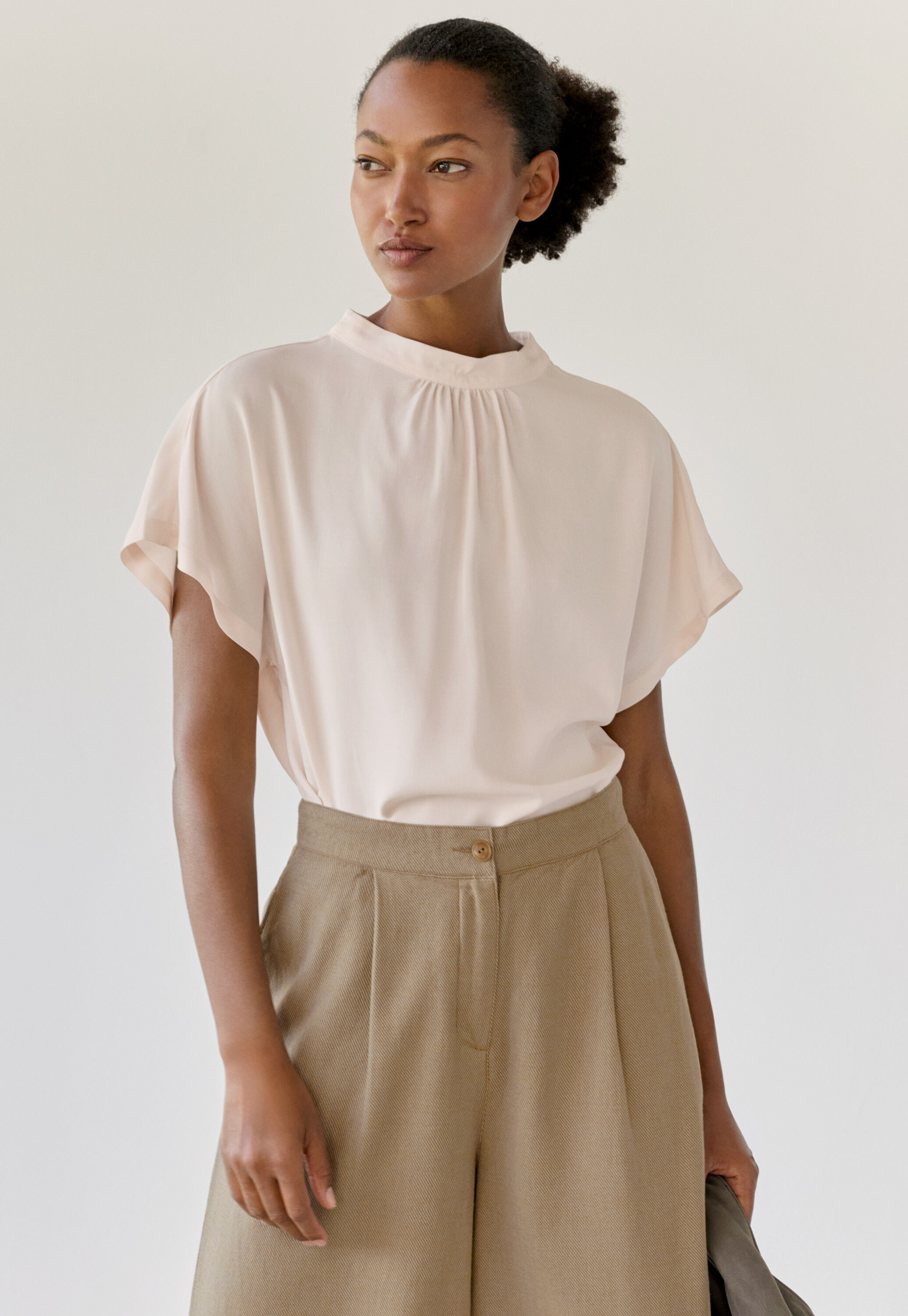 Kleid mit Peplum-Saum